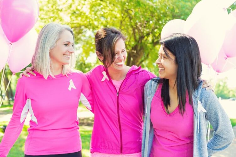 three women in pink